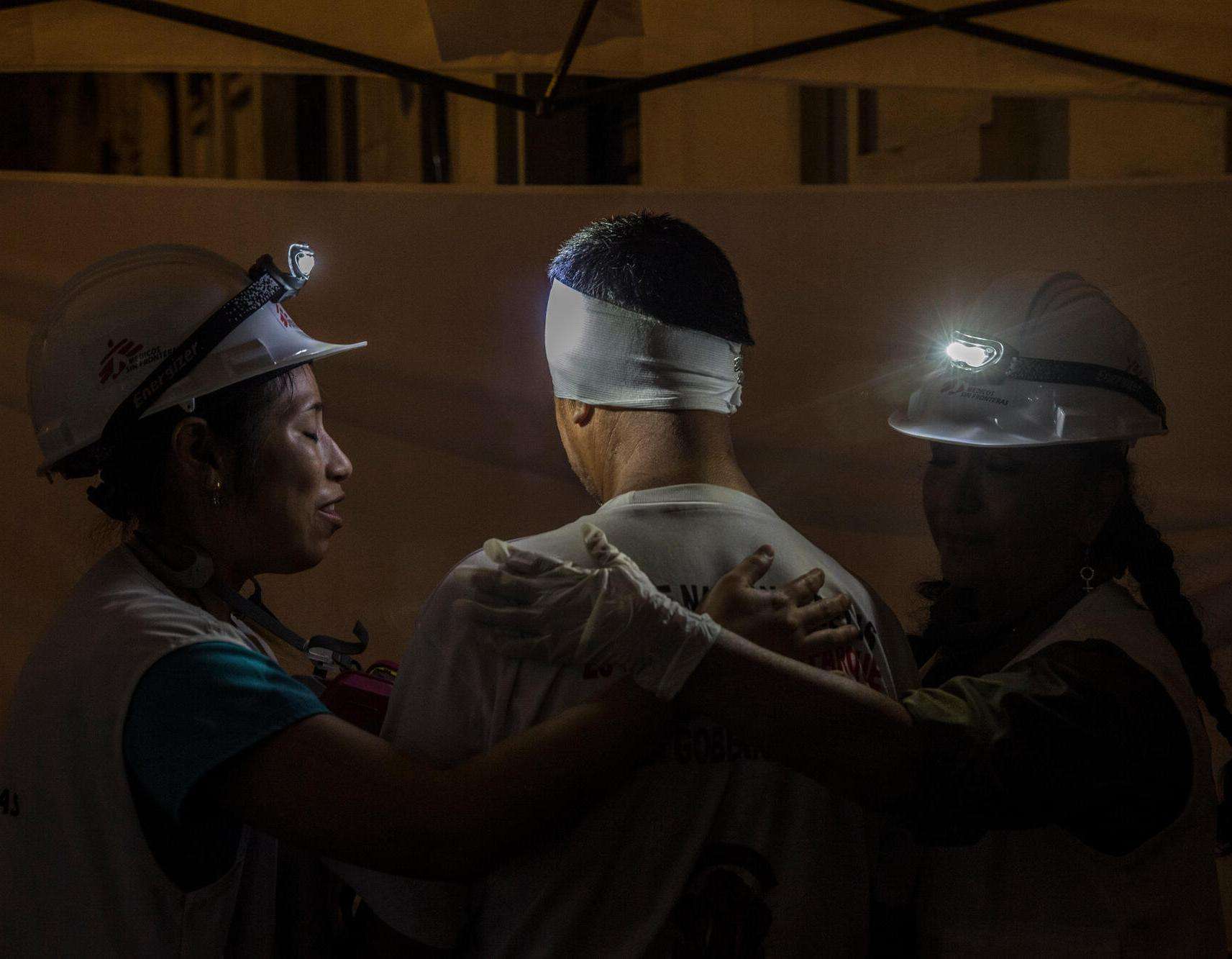 Treating people injured during the protests in Lima