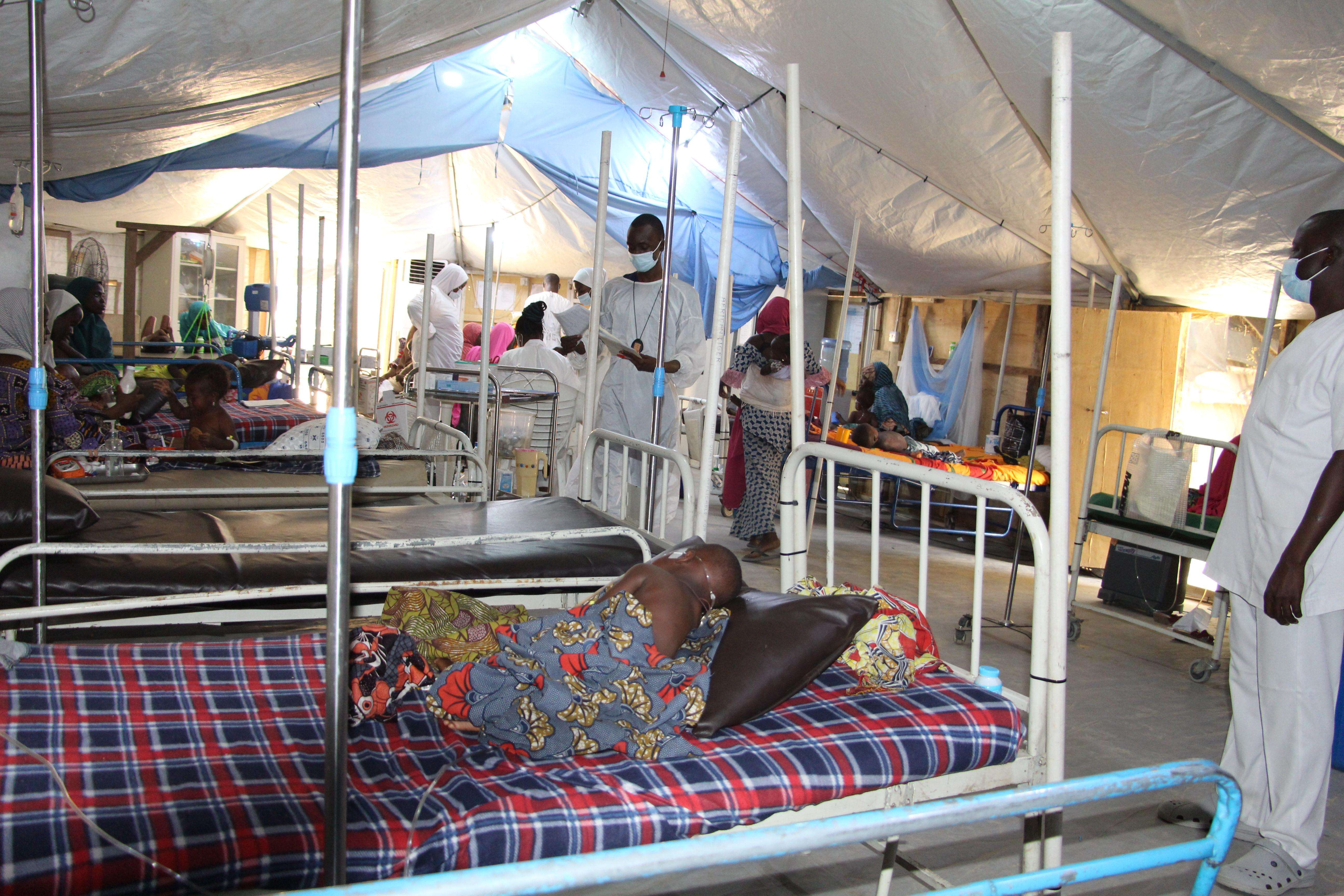 Patient laying in bed in a Zabarmari clinic