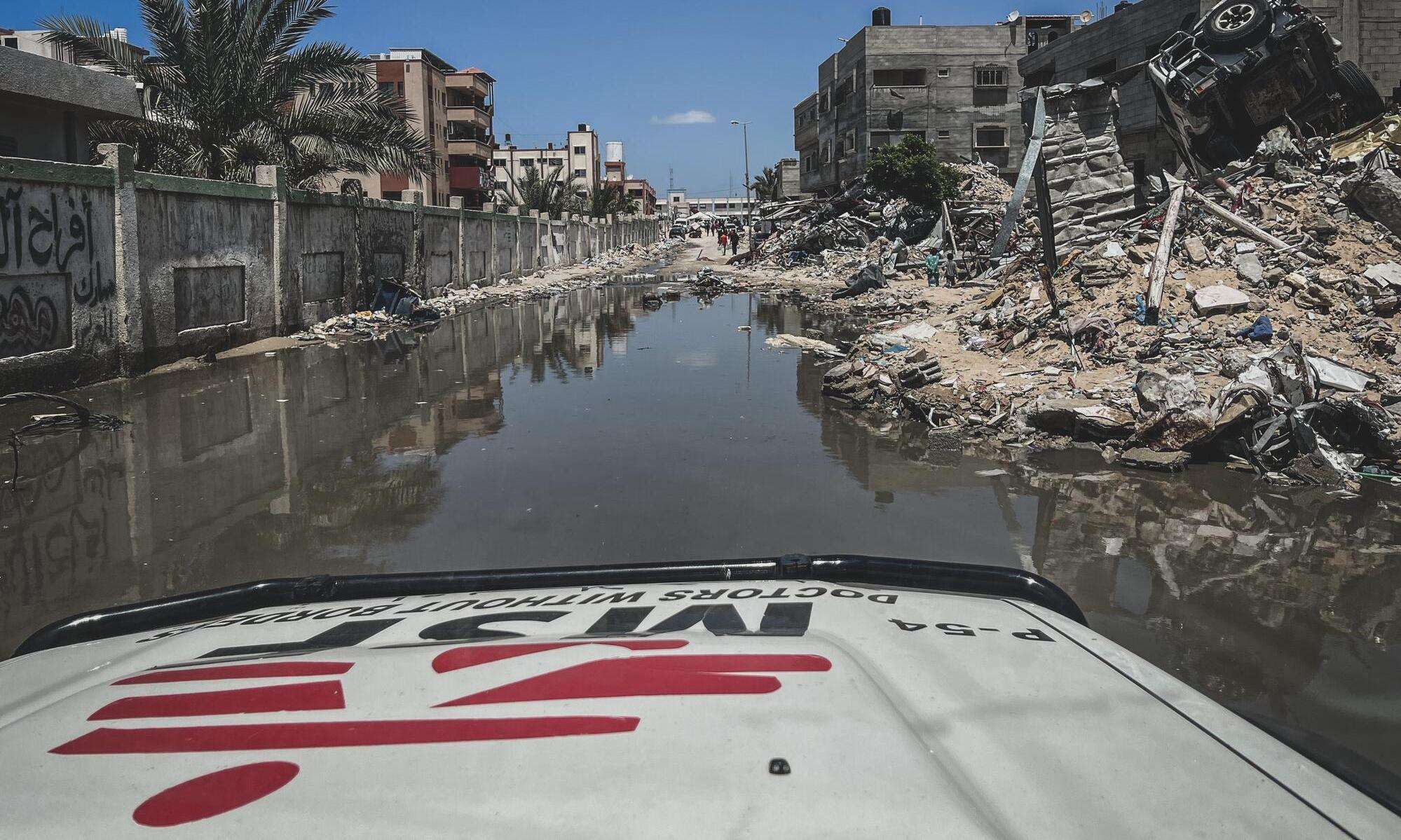 Flooded streets and wreckage in Gaza.