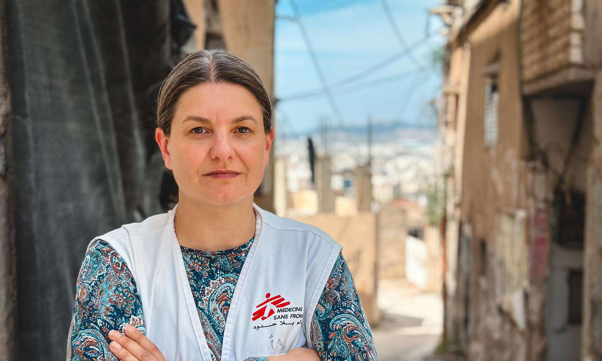 Woman in MSF vest standing in Jenin City, West Bank, Palestine. 