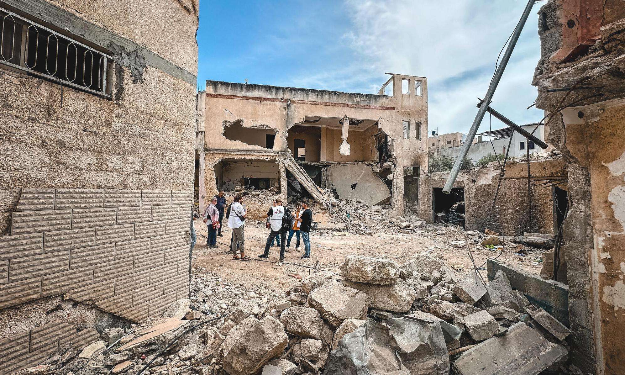 An MSF team surveys the destruction caused by an Israeli incursion in the West Bank. 