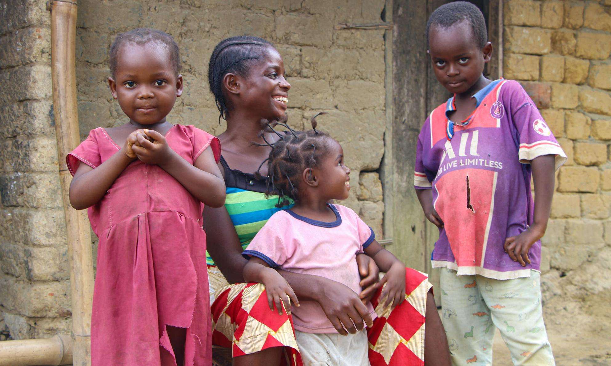 Children smile in DRC after a measles vaccination. 