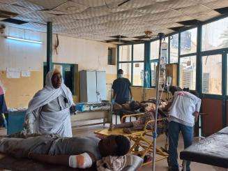 An MSF hospital room with patients on gurneys in Khartoum, Sudan.