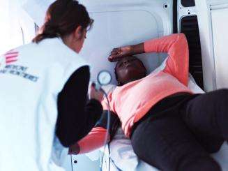 MSF widwife, Alessia Alberani, during a consultation with a pregnant patient in the mobile clinic in Ventimiglia, Italy