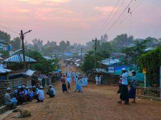 Rohingya refugees meet up and talk in the streets of the camps of Cox's Bazar.