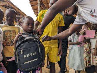 A child is vaccinated for measles in Ingende health zone, DRC.