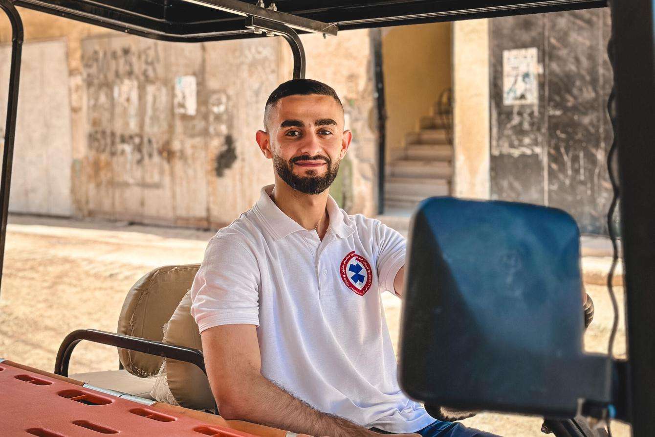 A volunteer paramedic smiles in the West Bank city of Jenin, Palestine.