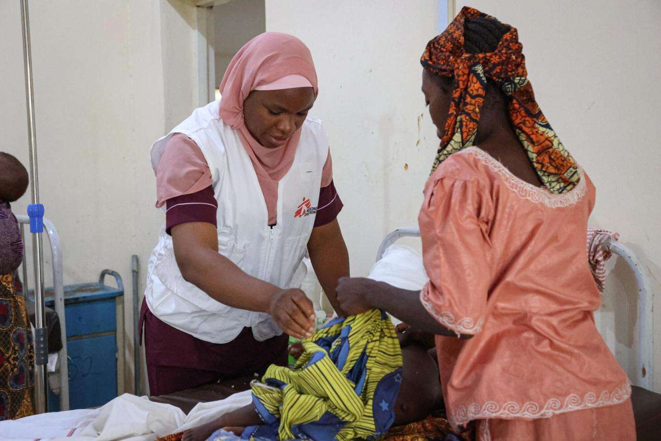 MSF nurse tends to malnutrition patient in Nigeria. 