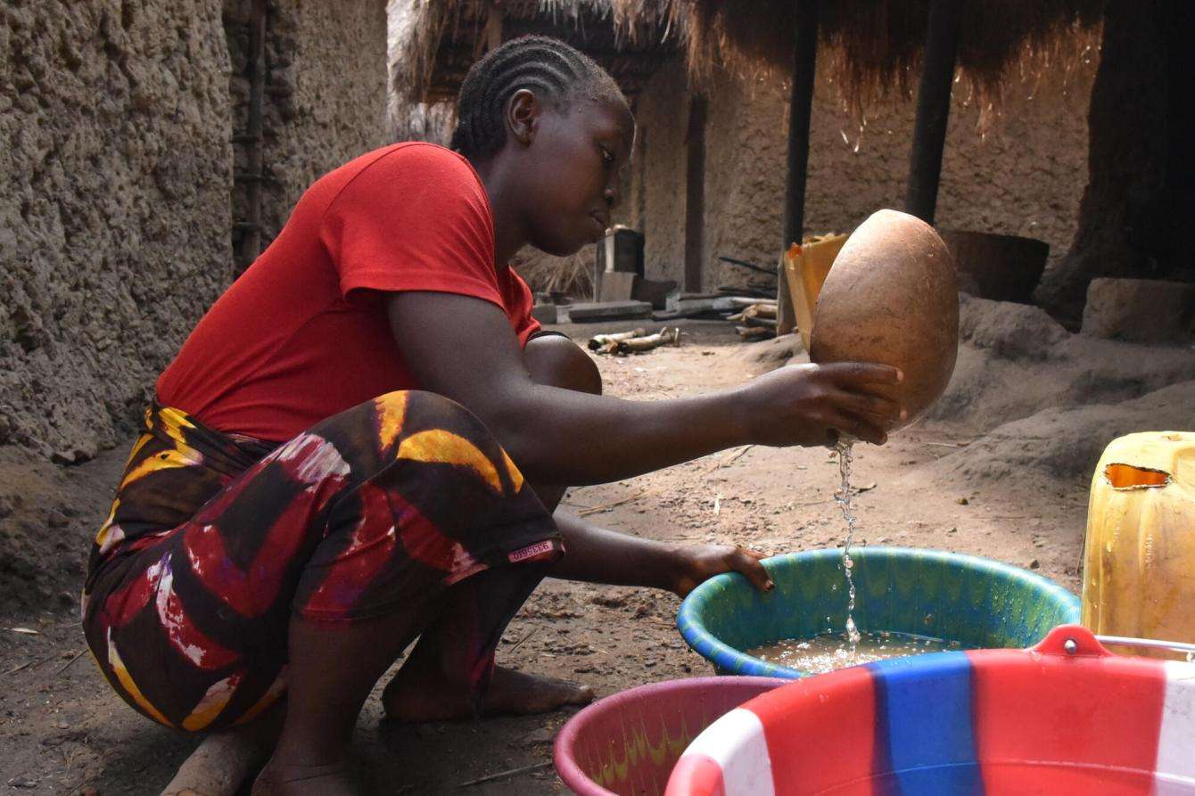 A woman cooking in Sierra Leone