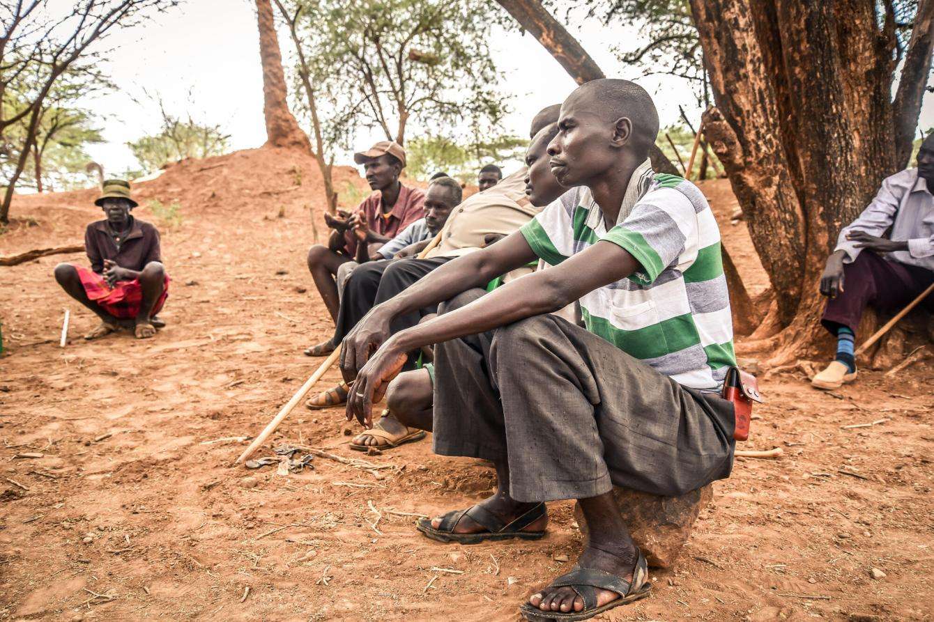 Community leaders in Tiaty, Baringo County sit through a focus group discussion on snakebites causes and prevention, led by MSF