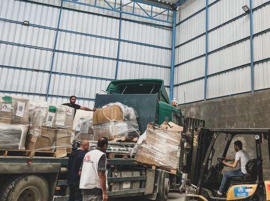 Tents are unloaded at the Médecins Sans Frontières logistics warehouse in the city of Rafah, Gaza. 