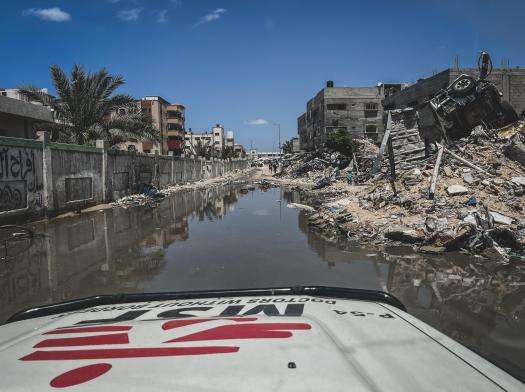 Flooded streets and wreckage in Gaza.