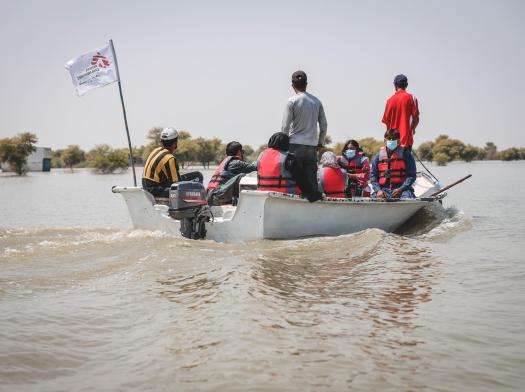 MSF teams travel by boat to reach people affected by floods in Pakistan.