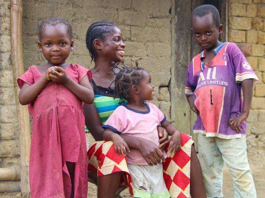 Children smile in DRC after a measles vaccination. 