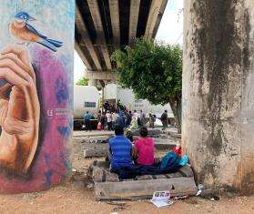 Migrants take shelter under a bridge in the city of Coatzacoalcos, Mexico.