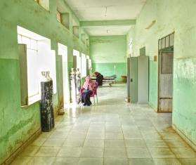 Green empty hallway with windows at Umdawanban hospital in Khartoum, Sudan