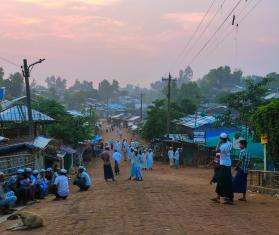 Rohingya refugees meet up and talk in the streets of the camps of Cox's Bazar.