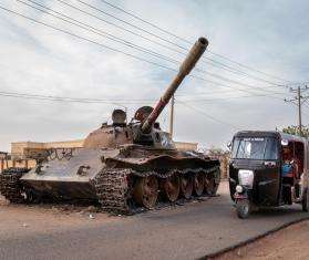 A tank beside a rickshaw in El Geneina, West Darfur, Sudan.