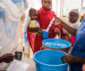 Distribution of therapeutic feeding milk in the nutrition tent at Adré pediatric hospital, where refugees from Sudan receive care. 