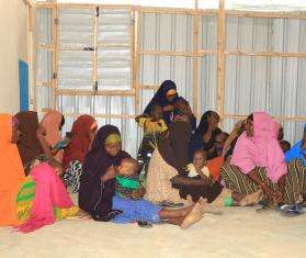 Mothers and children in a medical outreach center in Baidoa, Somalia. 