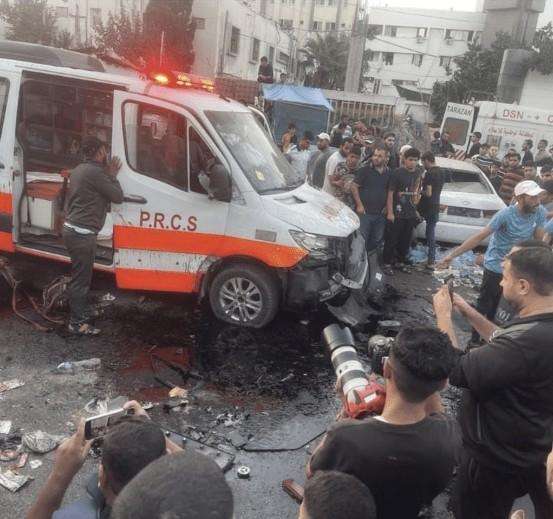 An ambulance is hit outside Al-Shifa hospital in Gaza City on November 3.