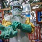 An MSF team member prepares to enter the high risk zone of the Ebola treatment center in Mangina, DRC.